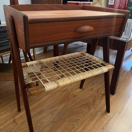 Caned magazine shelf mailed to Caning Canada for weaving restoration