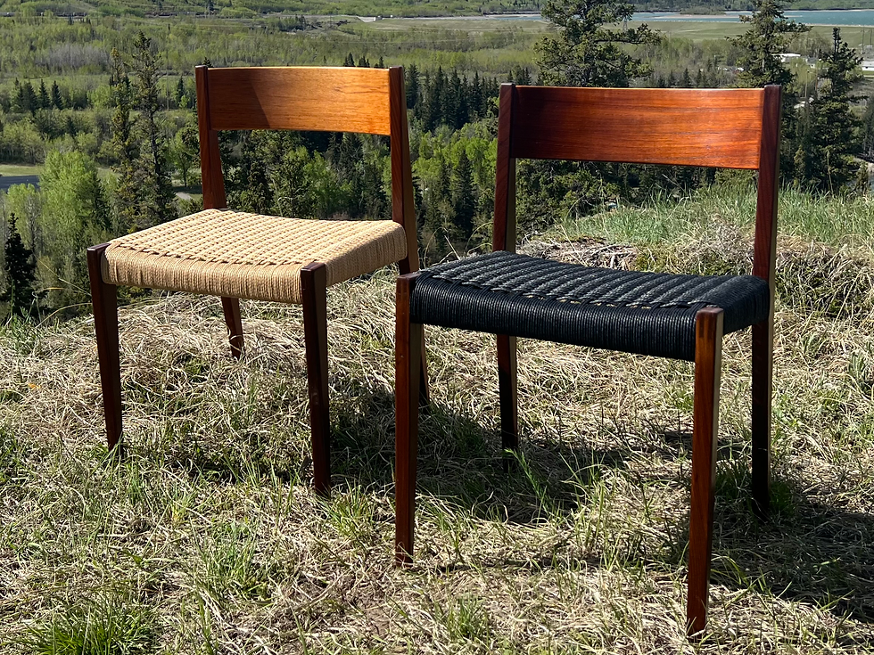 Two Pia Chairs design by Poul Cadovius, 1959 with natural and black single rail Danish cord weaves, displayed in Alberta’s natural beauty