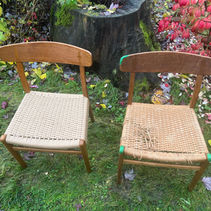 Two Hans Wegner Chair 23, one restored with fresh Danish cord and the other needing restoration by Caning Canada in Vancouver.