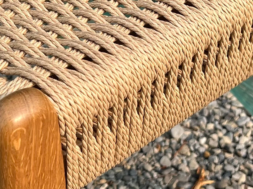 Side view of Hans Wegner's Chair 23 woven in laced Danish cord by Caning Canada, White Rock, BC