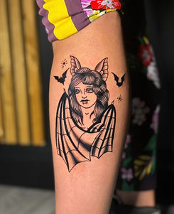 black and grey neo traditional vampire lady tattoo on leg done in toronto