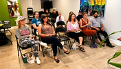 People sitting in chairs at Amaya Shiva Speaker Series Event