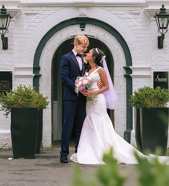 Bride and Groom stealing a moment at Woughton House in Milton Keynes.