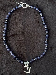 Thumbnail: Blue Goldstone Ohm Pendant Necklace