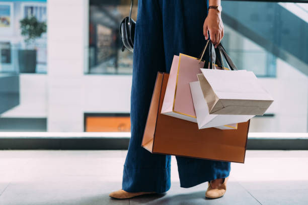 hand full of shopping bags