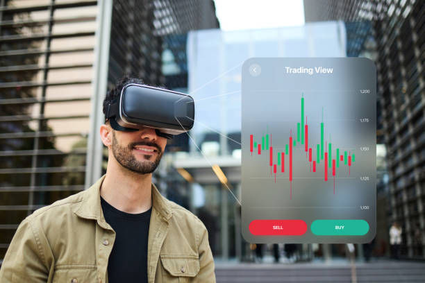 Man wearing VR headset views trading graph labeled "Trading View" with "Sell" and "Buy" buttons. Urban setting, modern architecture.