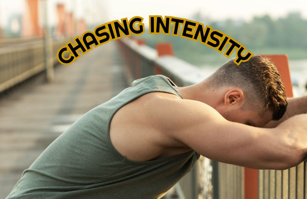 Man in a gray tank top leans over a bridge railing, appearing exhausted. "CHASING INTENSITY" text arcs above him. Background is blurred.