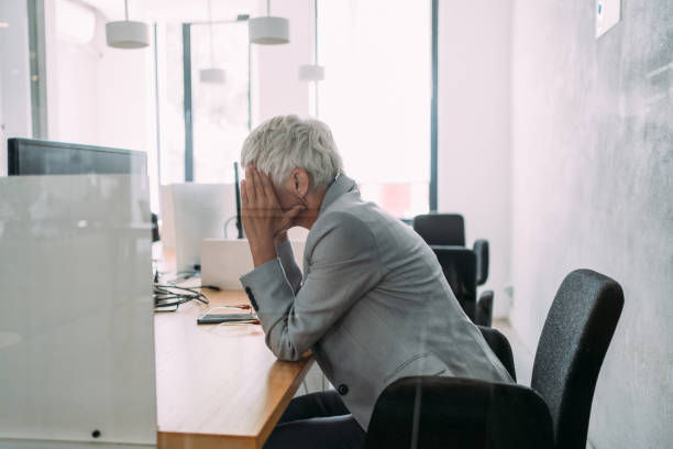 Stressed woman working in modern office