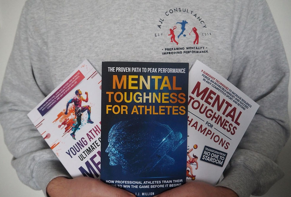 Person holds three books on mental toughness in a gray shirt with a logo. Titles focus on athletes, champions, and young athletes.