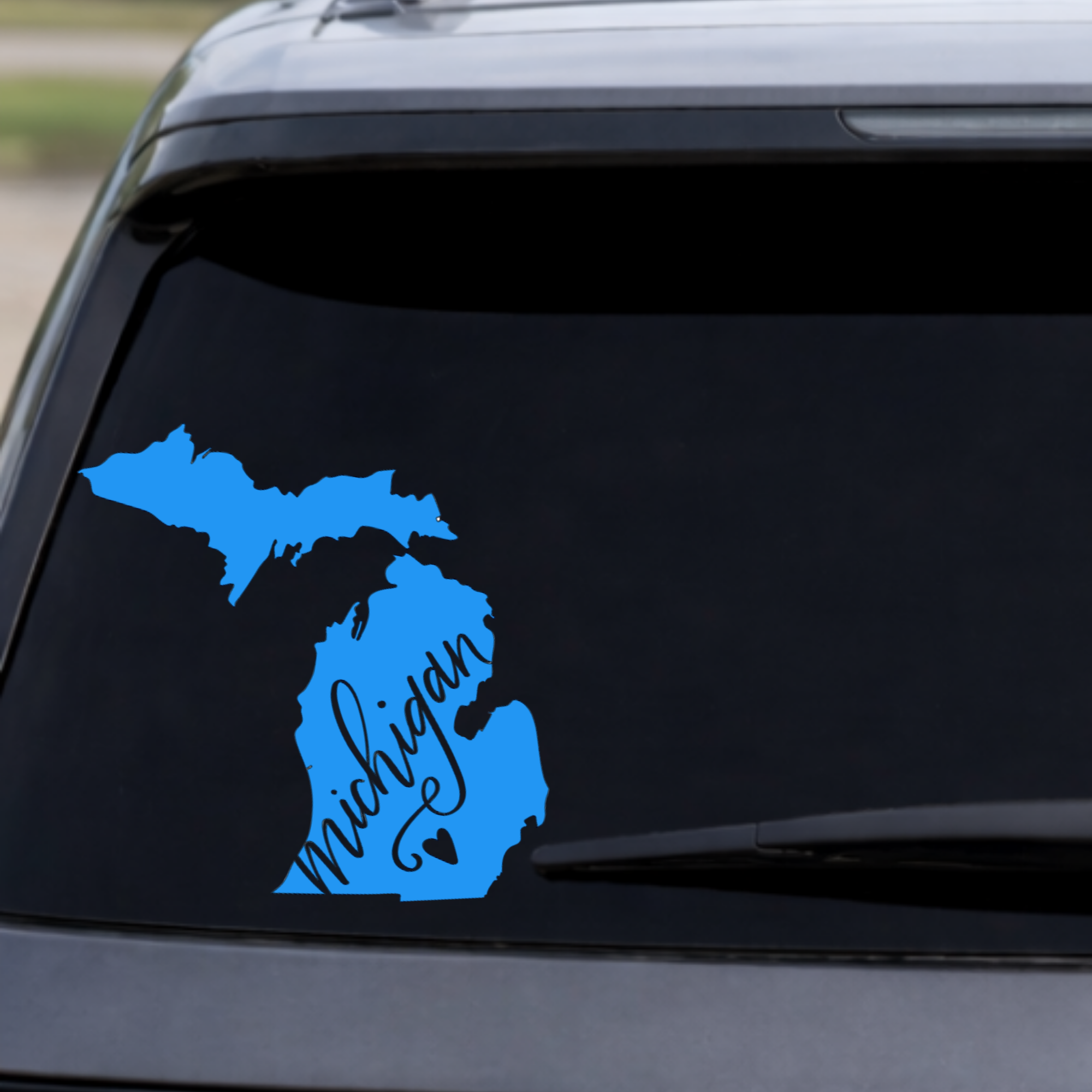 michigan script car decal on vehicle window