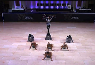 In a formation during a dance