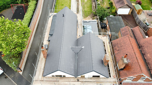 Above view of a commercial building with a grey roof