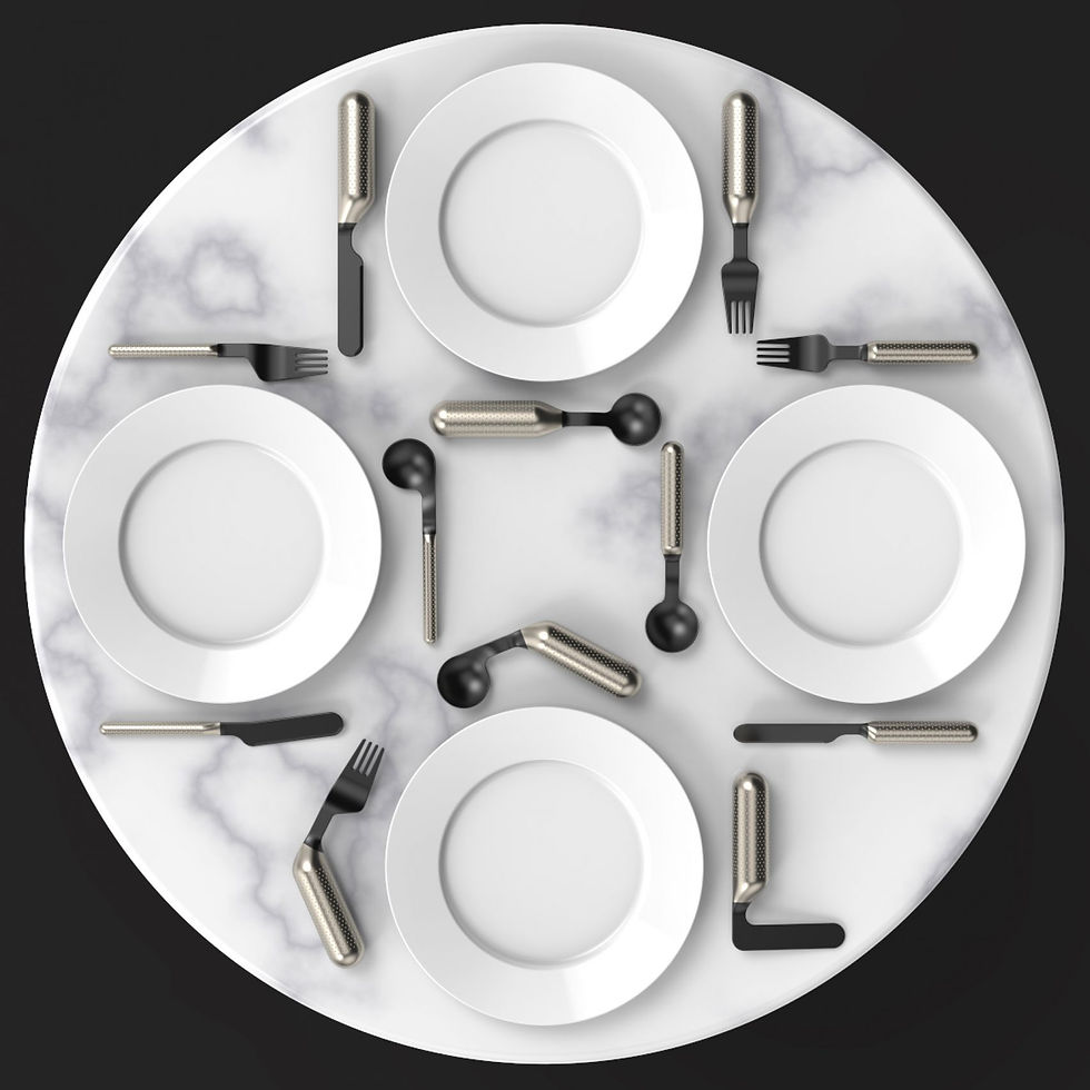A round table dinner setting. 4 plates with cutlery. The cutlery features a stylish adaptive range with forks, knives, and spoons' designs adapted to suit needs of people with disabilities.