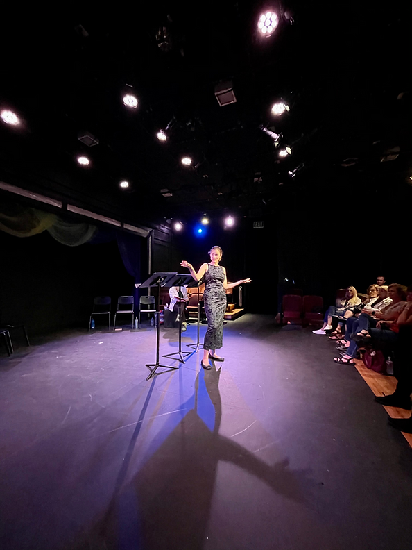 speaking at TGI Wayward Artist.png