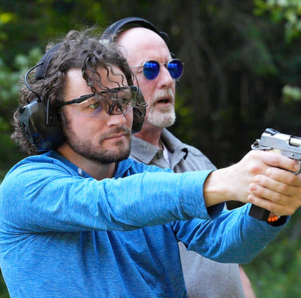 Coaching on handgun handling and aim outside of Missoula, MT