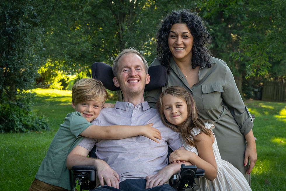 Justin, lori, talia and ben in their backyard during a recent photo shoot. they have so much love for each other!