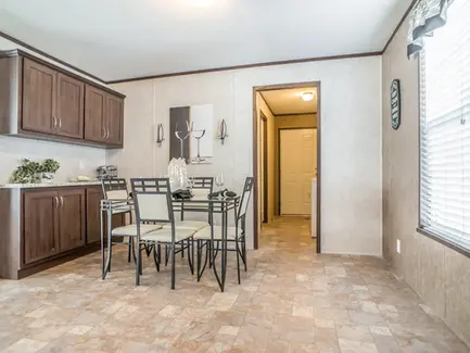 Redman Homes Dining Rooms. Custom Built Mobile and Modular Homes from Manufacturers like Redman Homes, Clayton Homes and Champion Homes. Custom built for Turnkey Communities properties. 