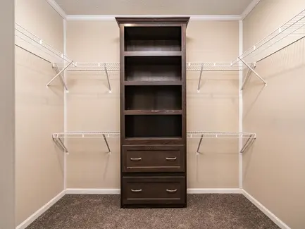 Redman Homes 2020 Louisville Show Model Walk In Closet. Custom Built Mobile and Modular Homes from Manufacturers like Redman Homes, Clayton Homes and Champion Homes. Custom built for Turnkey Communities properties. 