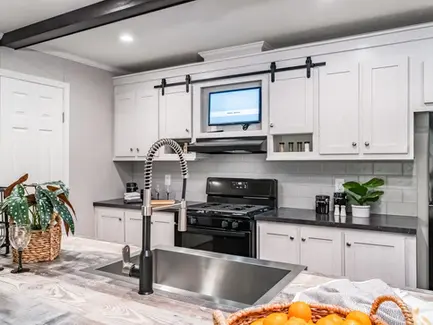 Redman Homes 2020 Louisville Show Model Kitchen. Custom Built Mobile and Modular Homes from Manufacturers like Redman Homes, Clayton Homes and Champion Homes. Custom built for Turnkey Communities properties. 