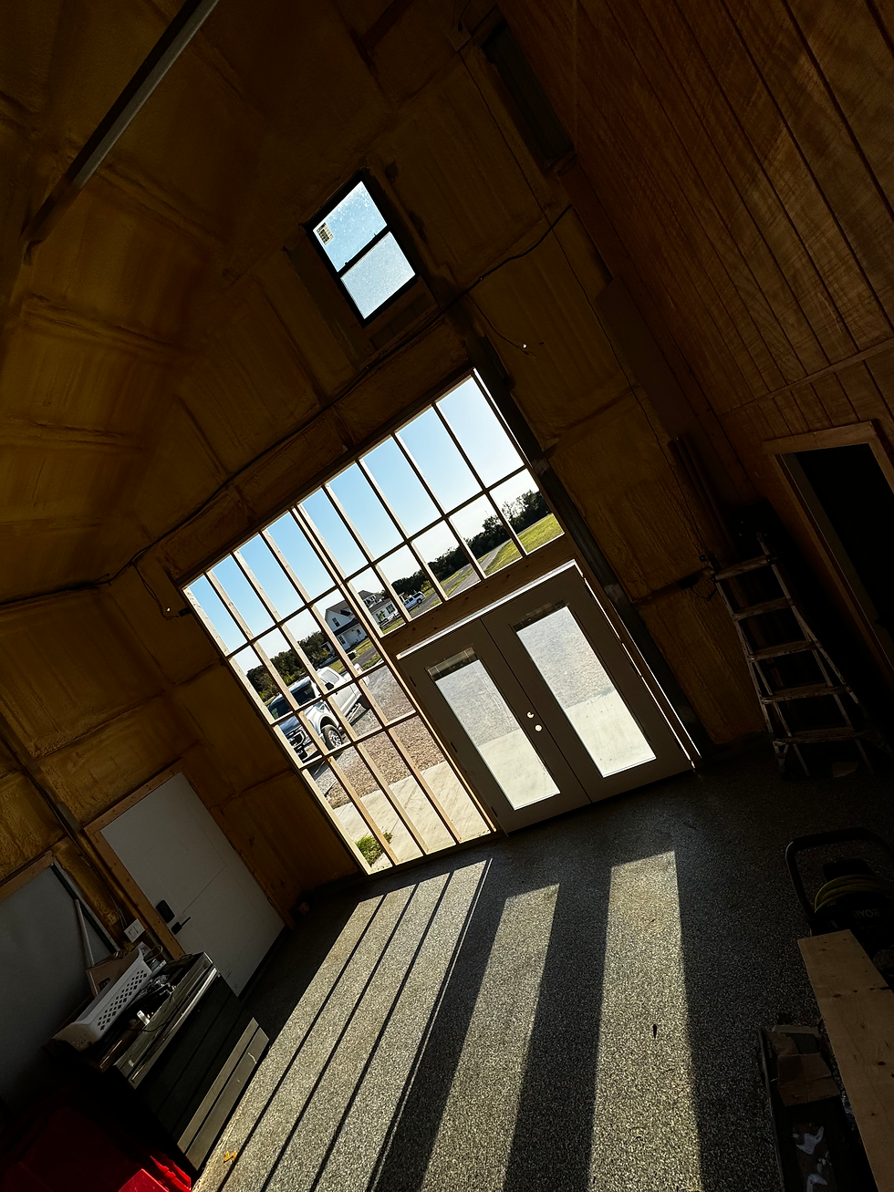 Completed garage conversion in Waco, Texas showing an insulated and finished room.