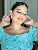 Karnica Karda showcasing her makeup skills with a flawless look