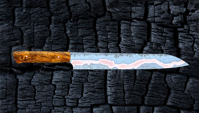 Copper-mascus Carver in Ironwood