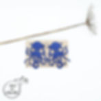 Boucles d'oreilles pieuvres en cuir recyclé faites par l'Atelier des Ombelles