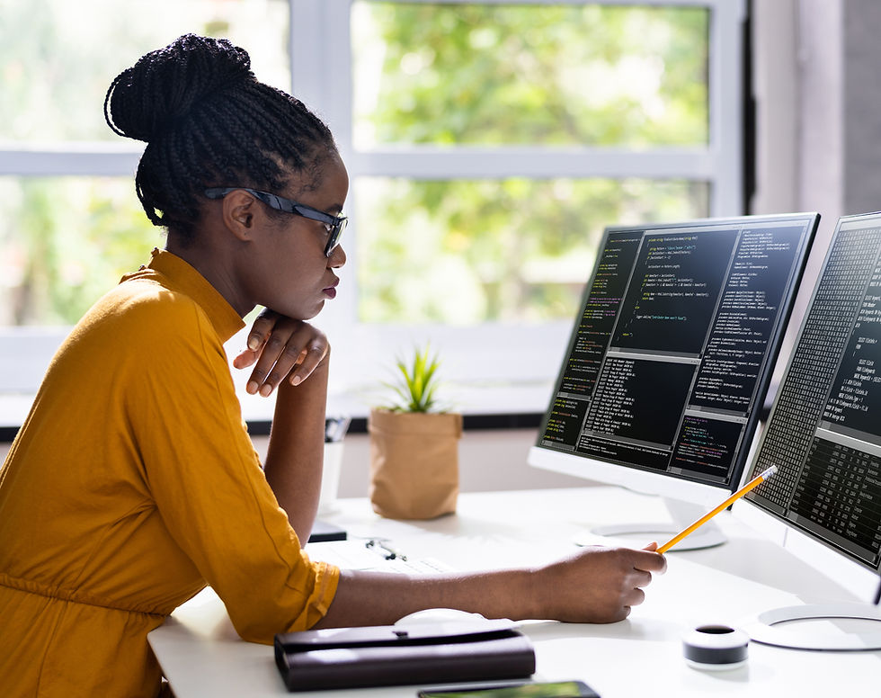 Woman Coding at Desk