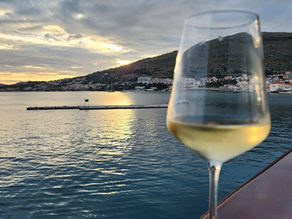 Wine glass on a ship railing in Croatia