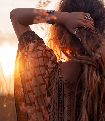 Lady looking at Sunset, Contact Us