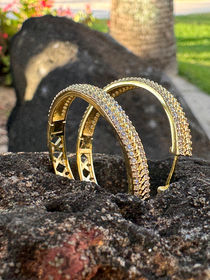 Gold hoop earrings with cubic zirconia stones