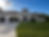 Luxury stucco home exterior painted white with dark architectural accents