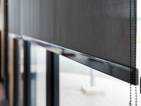 photo of manual dark roller shade