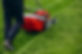 man-cutting-grass-with-lawn-mover-back-yard_1303-22795.jpg