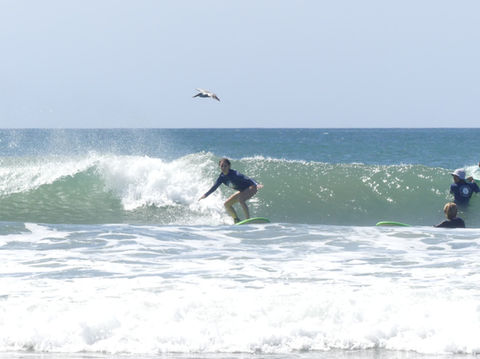 woman learning how to surf