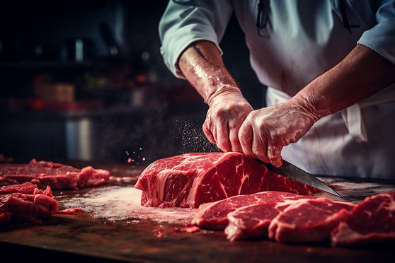 butcher-cutting-fresh-meat-pieces-close-up.jpg
