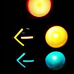 traffic light with yellow and green lite up