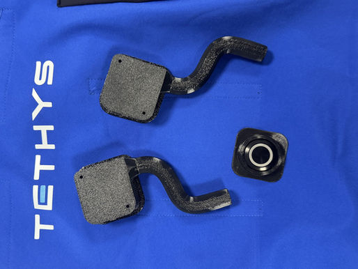 Flexible 3D printed TPU 90A cases on a blue Tethys cooling vest