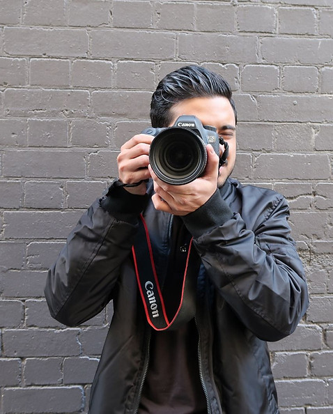 A person holding a camera
