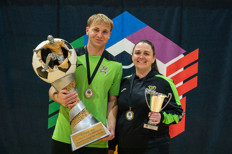 West Coast Cobras Men's Head Coach Annie Farrell pictured with Club Captain Luke Ross after their Grand-Final win.