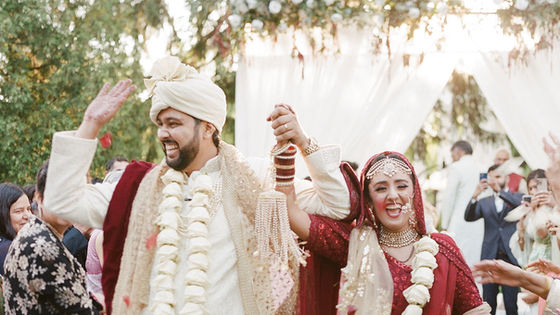 Couple dancing down the aisle