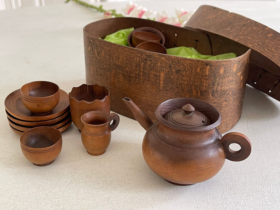 Thumbnail: A late 1800s cedar wood miniature tea set. It consists of fourteen pieces including a tea pot, bowls, plates, jugs etc. The t