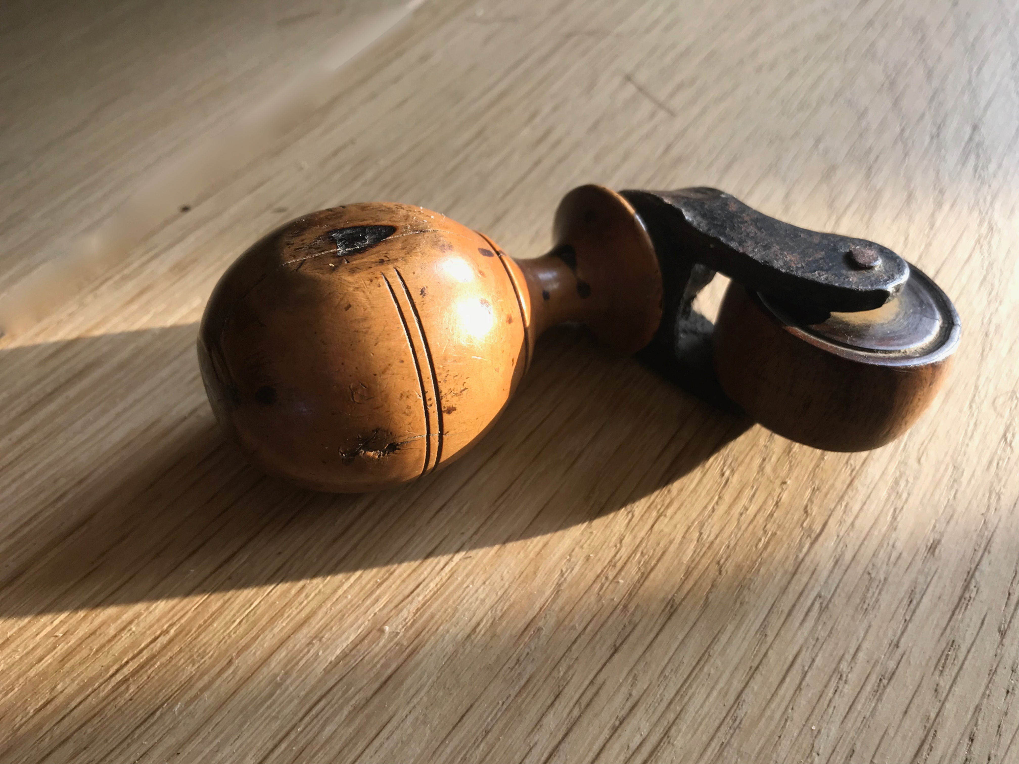 An antique treen book binders roller