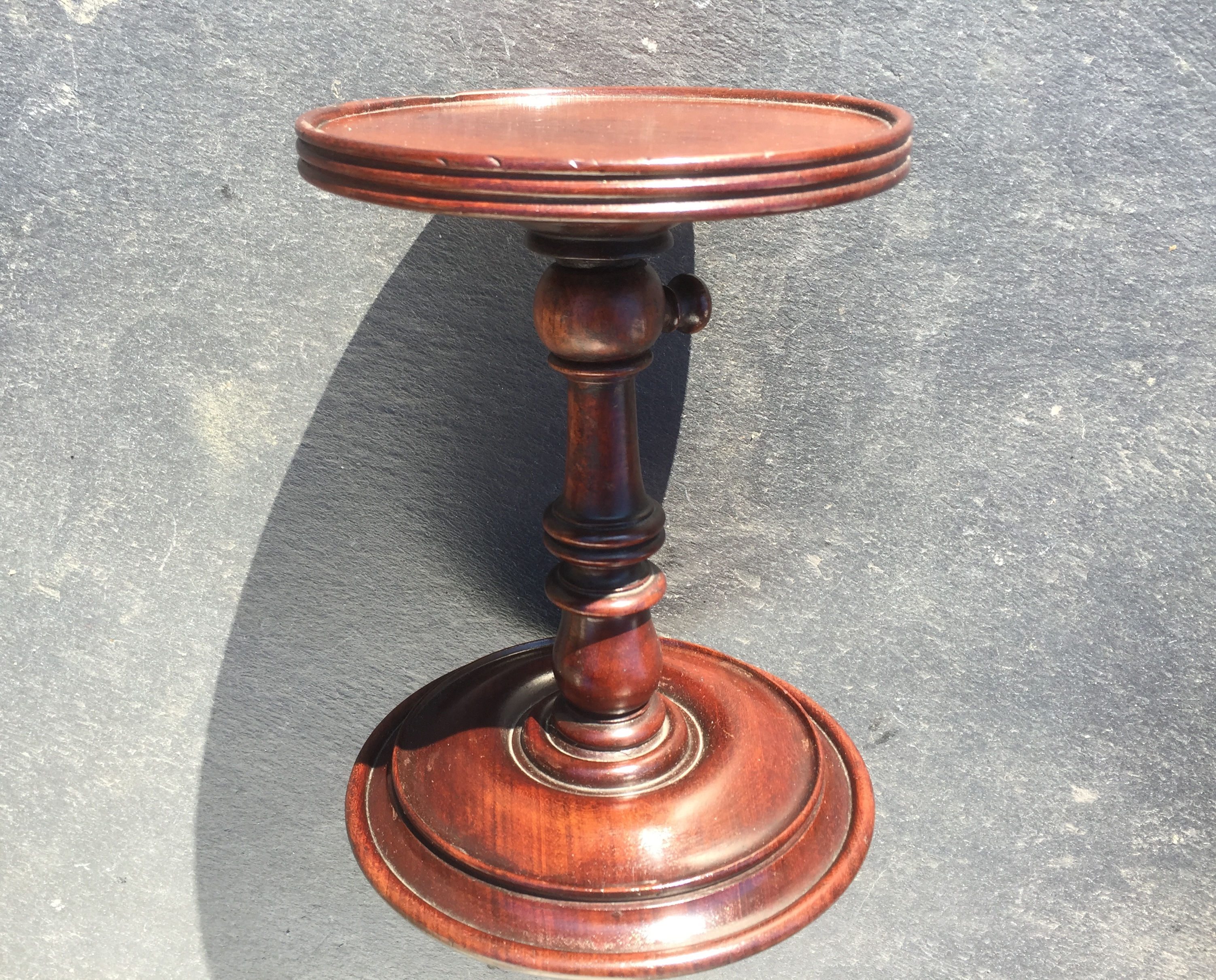 An Antique Mahogany Treen Candle Stand