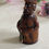 Thumbnail: antique coquilla nut figural tape measure