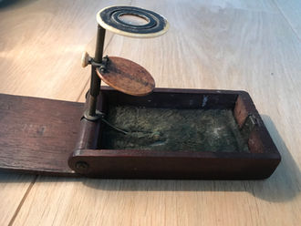 A Folding Pocket Microscope