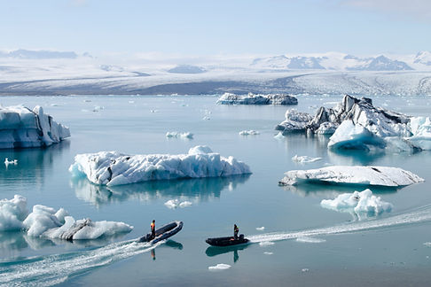 Boats Amid Icebergs