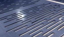 Aluminum. Laser cut panel.