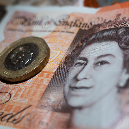 U.K. Reverts Tax Plans to Ease Market Worries