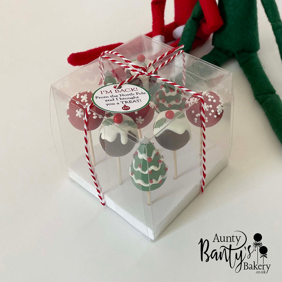 Thumbnail: Festive treat box of handcrafted cake pops including Elf-themed designs, Christmas trees, puddings, and baubles